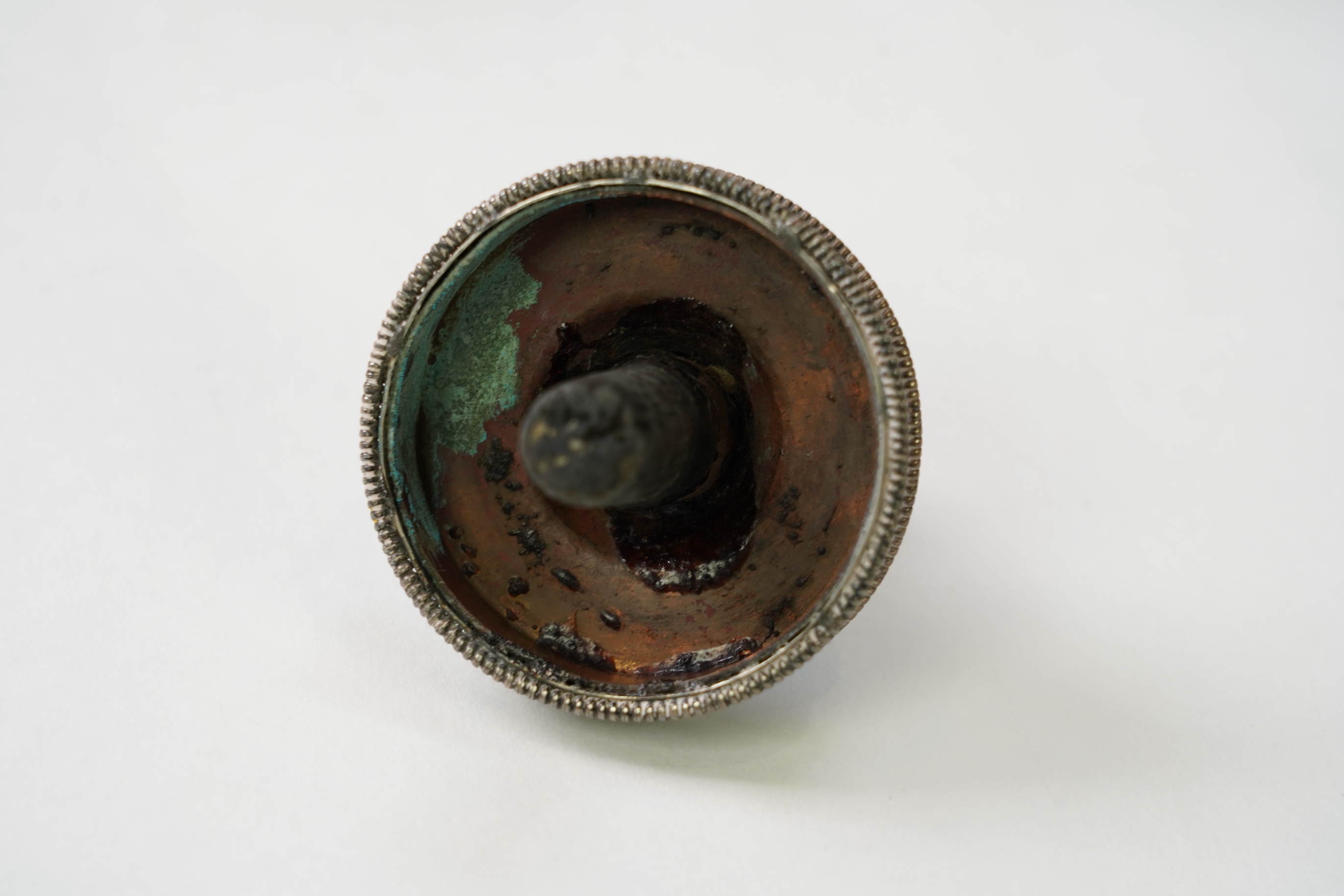 A Tibetan copper and silver mounted ink-stand, 19th century